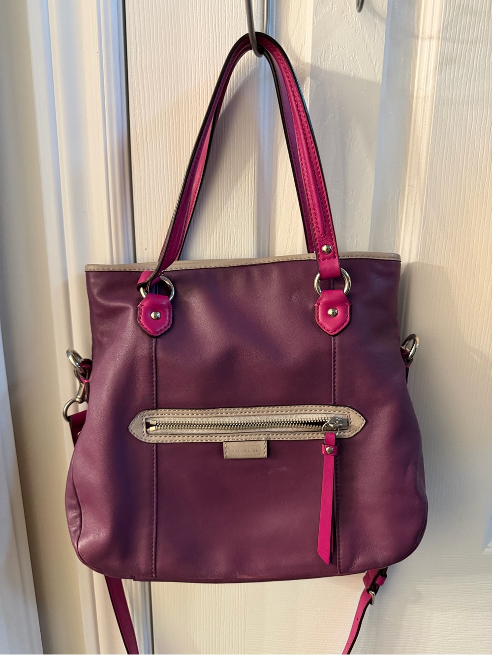 Vibrant Coach Daisy Spectator Leather Mia crossbody bag.